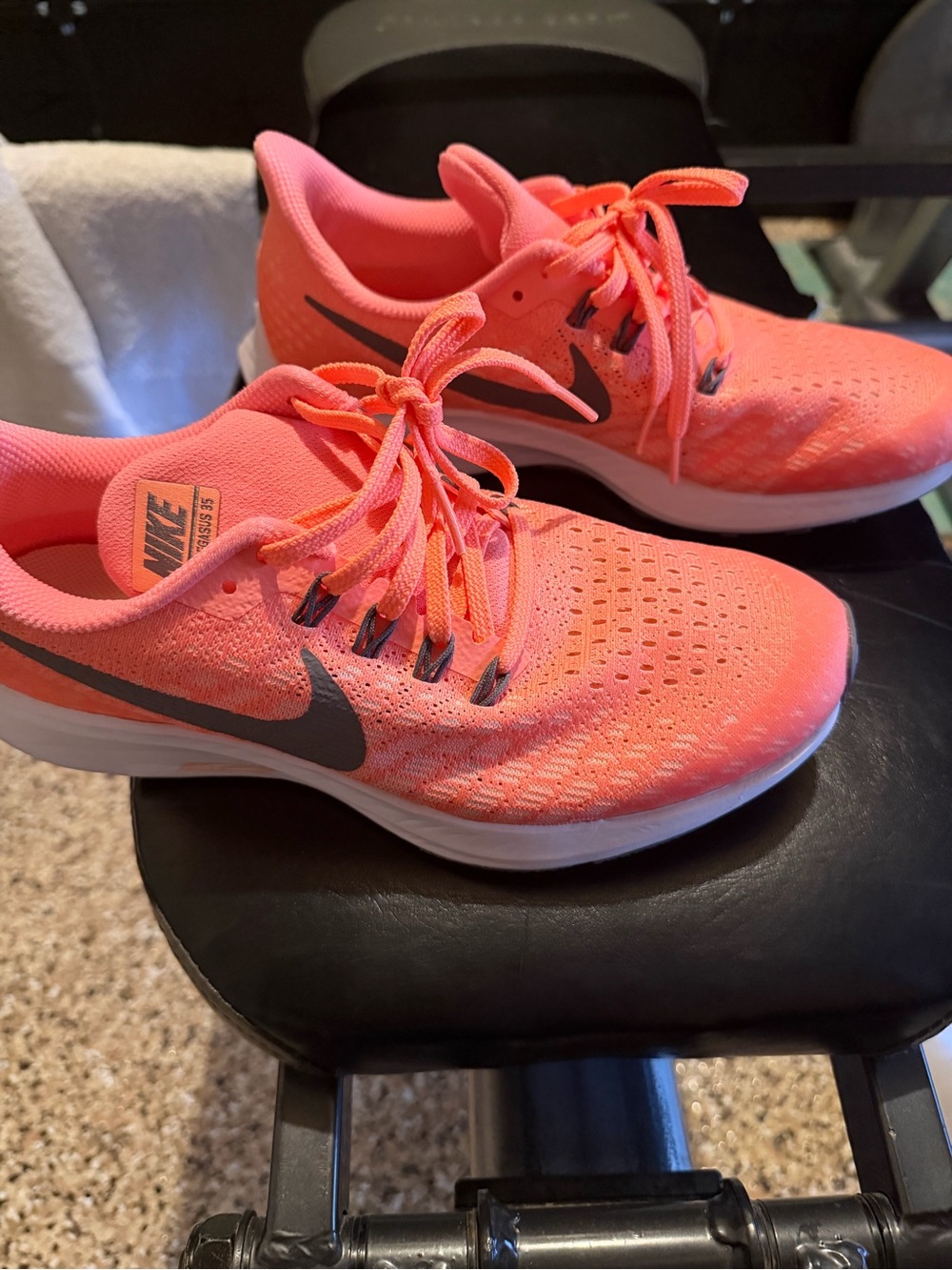 Nike Women's Coral Pink Running Sneakers with Gray Swoosh